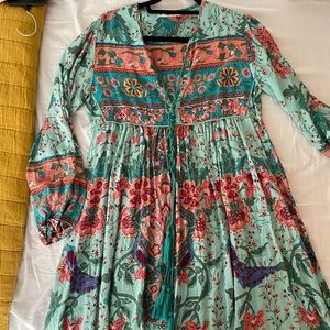 Long sleeved midi dress with tie closer at chest